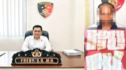 Ketgam: Kasat Reskrim Polres Majene AKP Fredy, S.H., M.H., bersama barang bukti uang tunai yang diamankan dari terduga pelaku pencurian di Pasar Sentral Majene. (Humas Polres Majene)