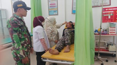 Foto: Andi Rustan alias Andi Olleng saat menjalani perawatan di Puskesmas Kahu setelah terlibat perkelahian di SPBU Labuaja. (ENews)